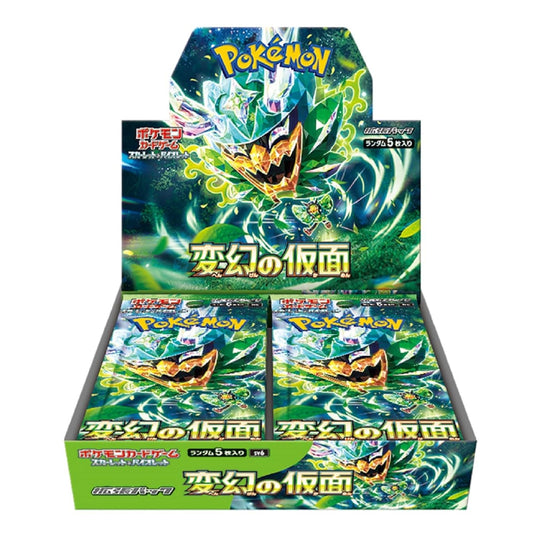 A Pokémon TCG display box filled with booster packs, featuring artwork of a green and blue dragon-like Pokémon on the front panel and matching pack art inside the display.