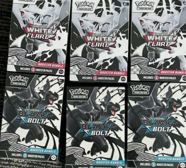 Pokémon trading card game booster packs featuring White Flare and Black Bolt.