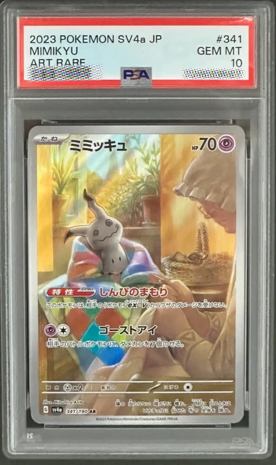 Pokémon trading card featuring Mimikyu with PSA grading label