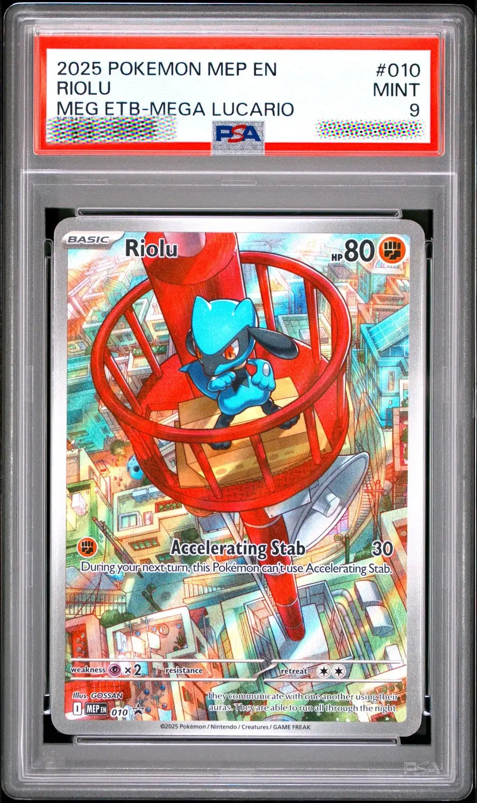 A graded Pokémon trading card of Riolu MEG ETB-MEGA LUCARIO from 2025, sealed in a PSA/sgraded holder with a red and white label at the top.