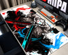 Roronoa Zoro One Piece anime gaming mouse pad featuring dramatic black and white samurai artwork, crossed swords, and bold red, cyan, and blue brushstroke accents.