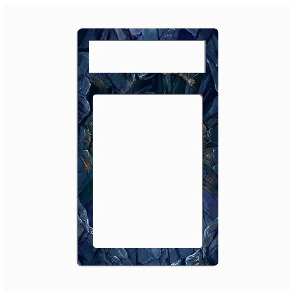 A rectangular decorative plate or frame insert with a dark blue and black textured stone-like border and two large white cutouts, shown on a plain light gray background.