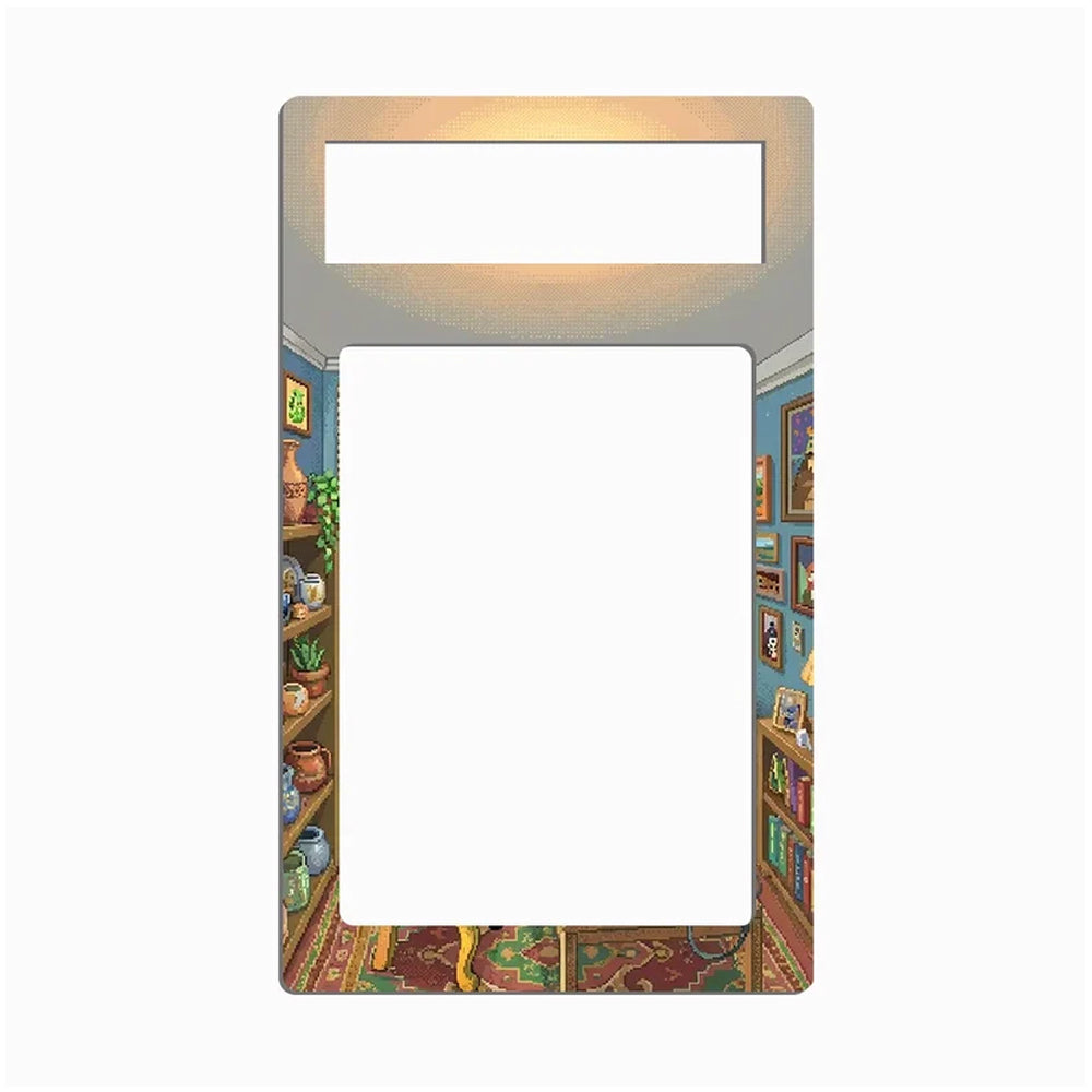 A decorative metal license plate frame featuring an illustrated vintage library scene with bookshelves, books, and framed pictures on the sides, shown on a plain white background.