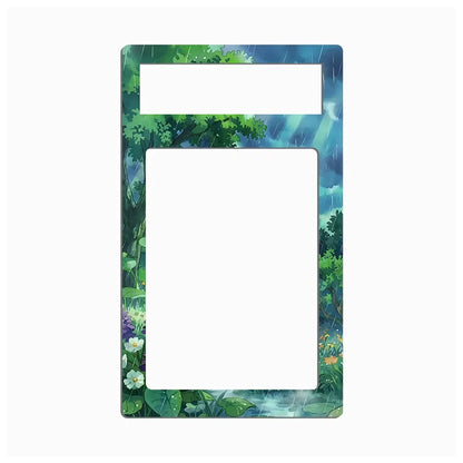 A rectangular picture frame with a decorative anime-style nature border. The border features green trees, lily pads, rain, and water, with a white rectangular cutout at the top and a larger white cutout in the center.