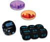 Set of black dice with blue numbers and two colorful circular objects on a white background