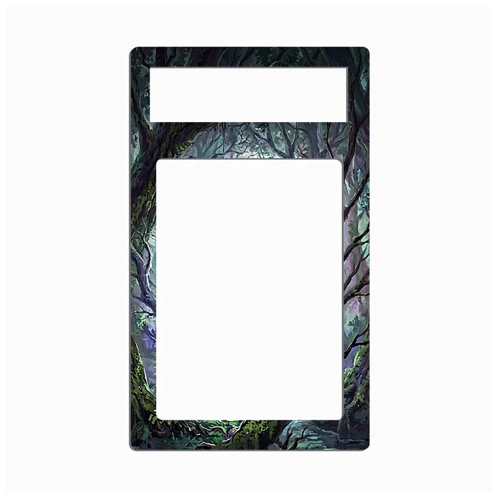 A rectangular picture frame with a decorative dark forest border featuring gnarled tree branches and mossy green foliage, shown against a plain white background.