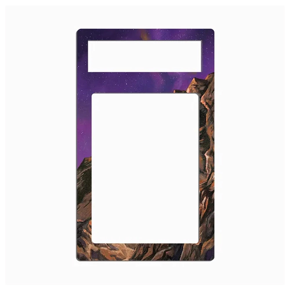 A rectangular light switch plate cover featuring a purple starry sky and brown rocky canyon landscape design, shown against a plain white background.