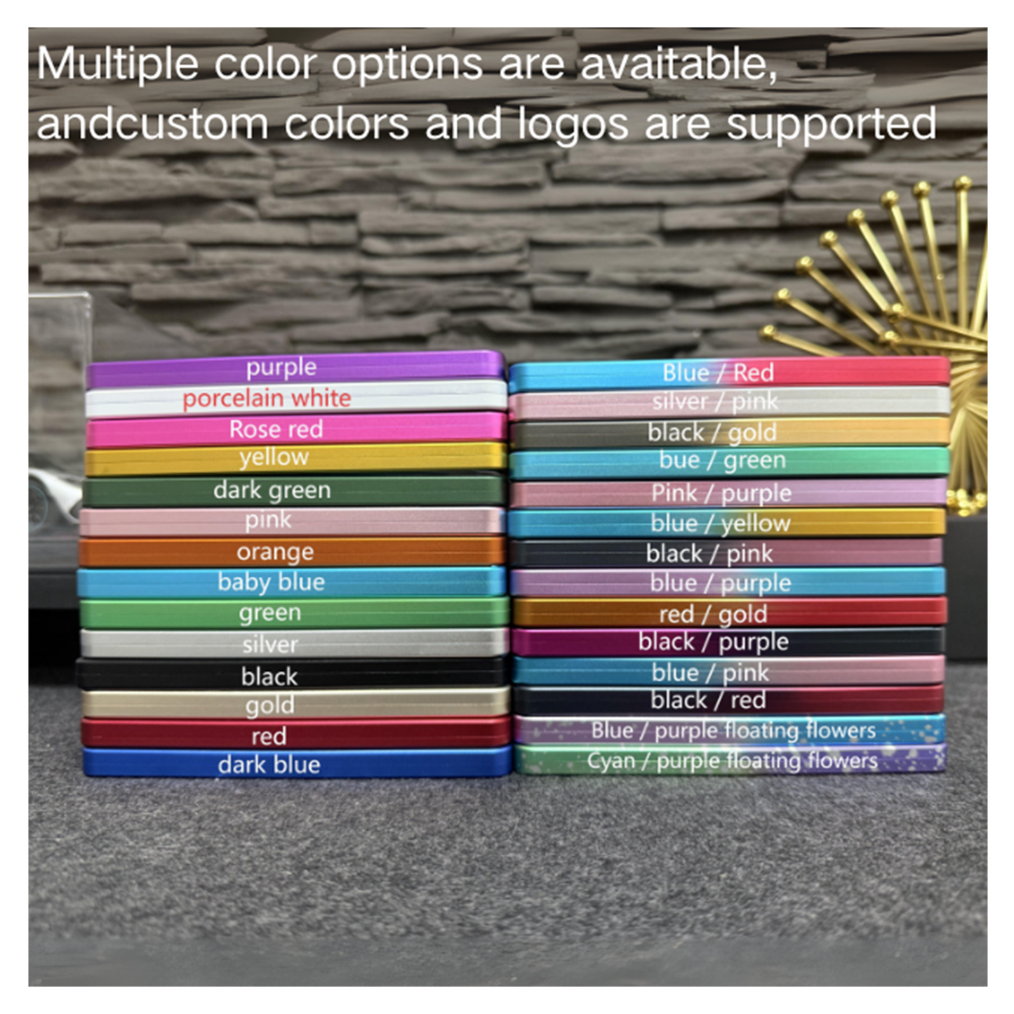 Stacks of colorful rectangular items with color options listed against a stone wall background.
