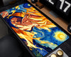 A rectangular desk mat featuring an anime-style illustration of a blond character with a blue aura against a swirling Starry Night-inspired background, shown on a desk near a monitor and keyboard.