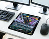 Noctali V Umbreon Pokémon card inspired mouse pad on a clean white gaming desk setup with RGB mechanical keyboard, dual monitors, and wireless mouse
