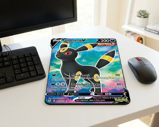Umbreon V Pokémon card inspired mouse pad on a clean white desk setup with black mechanical keyboard, wireless mouse, and minimalist monitor workspace