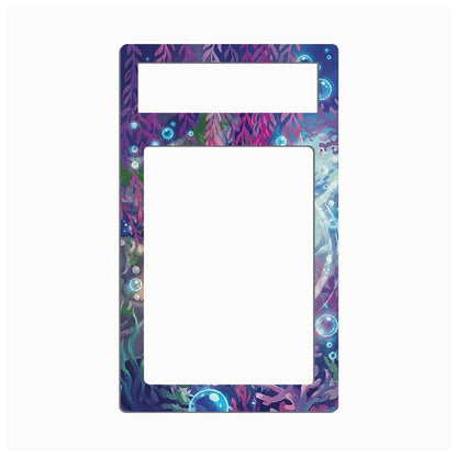 A decorative rectangular frame or plate insert with a colorful underwater coral and sea plant pattern in purple, blue, and pink, shown on a plain white background.
