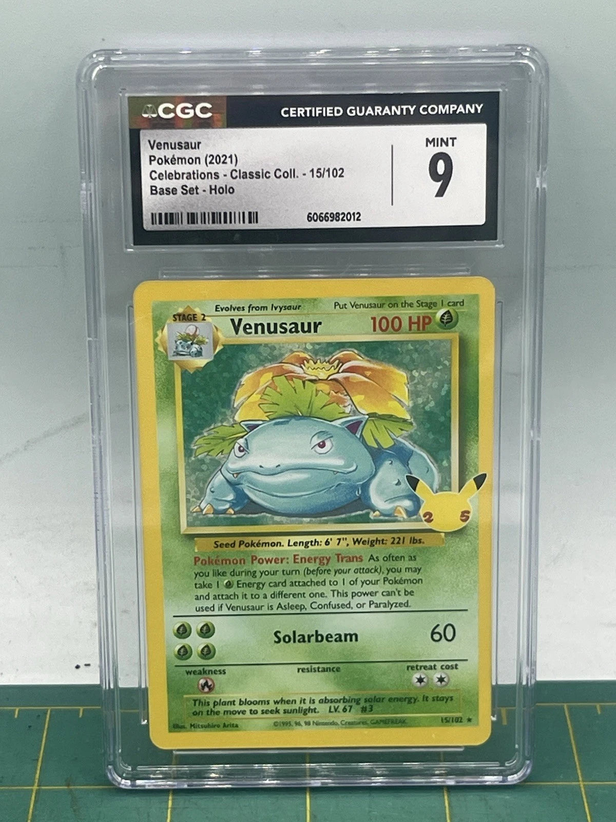 Venusaur trading card from a Pokémon trading card game, graded by CGC with a score of 9.