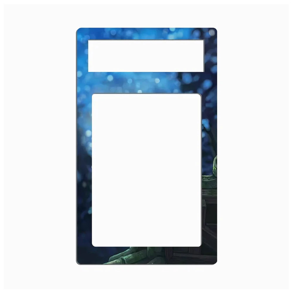A rectangular decorative plate or frame with rounded corners, featuring a blue bokeh-style background and a small illustrated green character detail at the bottom right, shown on a plain light gray background.