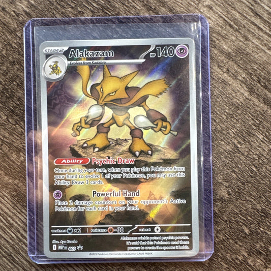 Pokémon TCG Alakazam MEP EN 009 Black Star Promo card from the Mega Evolution Elite Trainer Box, featuring Full Art by Aya Kusube with a holofoil finish.