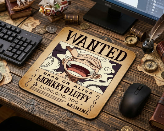 Monkey D. Luffy wanted poster themed anime mouse pad in vintage beige style, placed on wooden desk surrounded by pirate-inspired accessories, compass props, and gaming workspace setup