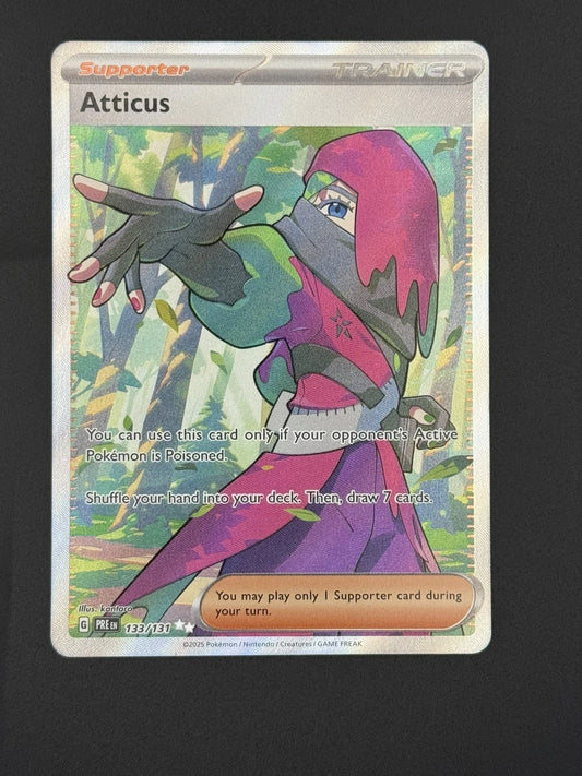 Pokémon TCG Atticus 133/131 Ultra Rare Full Art card from Prismatic Evolutions, featuring the Team Star boss with a shimmering prismatic finish.