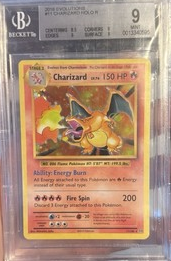 Trading card featuring Charizard with a BGS grading label on top