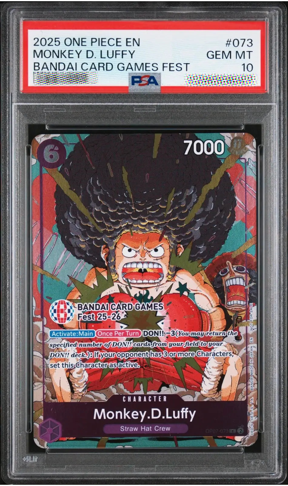 A graded One Piece EN trading card of Monkey D. Luffy, PSA 10 Gem Mint condition, encapsulated in a clear plastic grading slab.