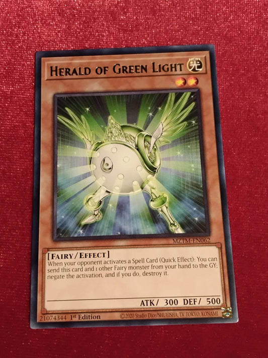 Yu-Gi-Oh! TCG Herald of Green Light MZTM-EN062 rare English card from Maze of Millennia set featuring Spell negation effect.