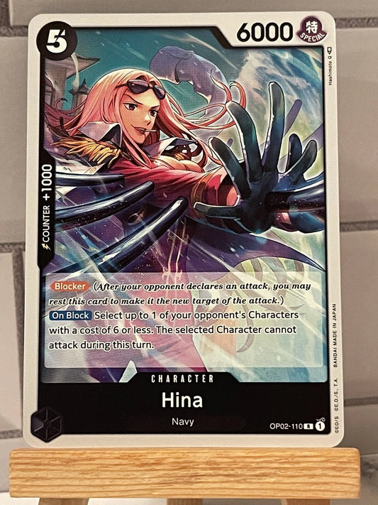 One Piece TCG Hina OP02-110 rare character card from Paramount War set featuring Navy officer artwork and official English text.