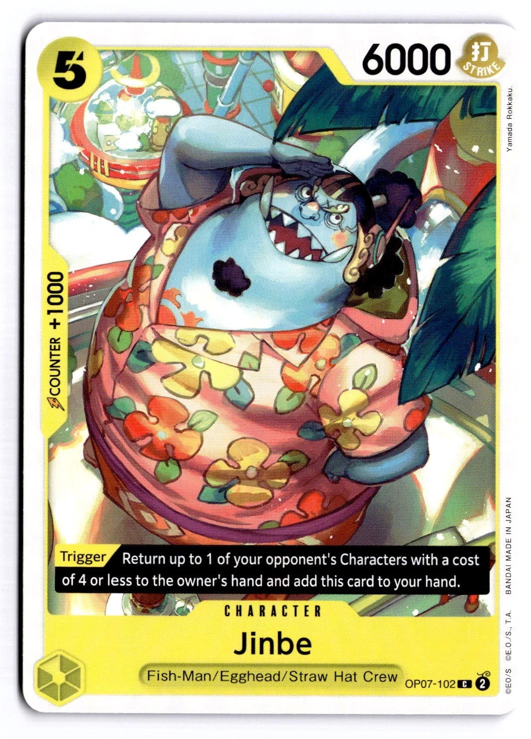 One Piece TCG character card OP07-102 featuring Jinbe, a blue Fish-Man in a pink floral shirt, saluting in a futuristic lab setting with palm trees.