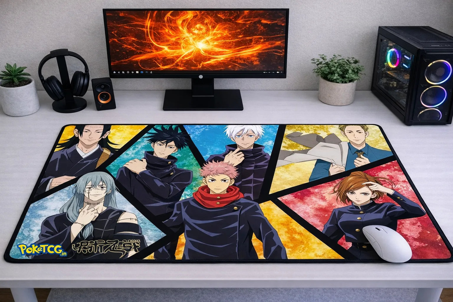 Large 24x12 inch Jujutsu Kaisen mousepad featuring a vibrant character collage of sorcerers and villains on a clean gaming desk setup.