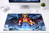 Large 24x12 inch One Piece mousepad featuring Luffy with blue lightning energy effects on a clean gaming desk setup.