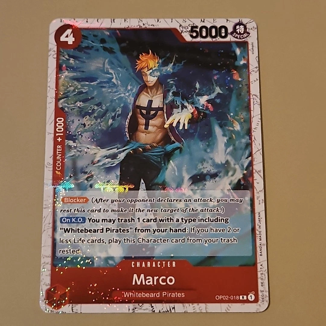 One Piece TCG Marco OP02-018 Jolly Roger holographic card from Paramount War set featuring premium foil and Phoenix commander artwork.