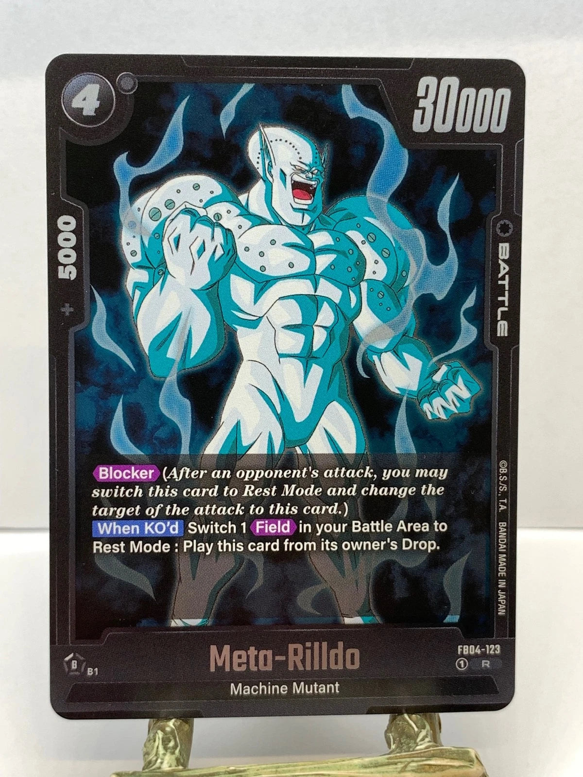 Dragon Ball Fusion World Meta-Rilldo FB04-123 rare Black card from Ultra Limit set featuring Blocker and Field-based resurrection.
