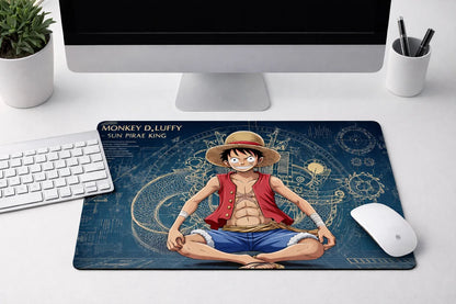 Monkey D. Luffy One Piece XXL gaming mousepad on a desk setup, featuring a high-precision fabric surface and non-slip rubber base.