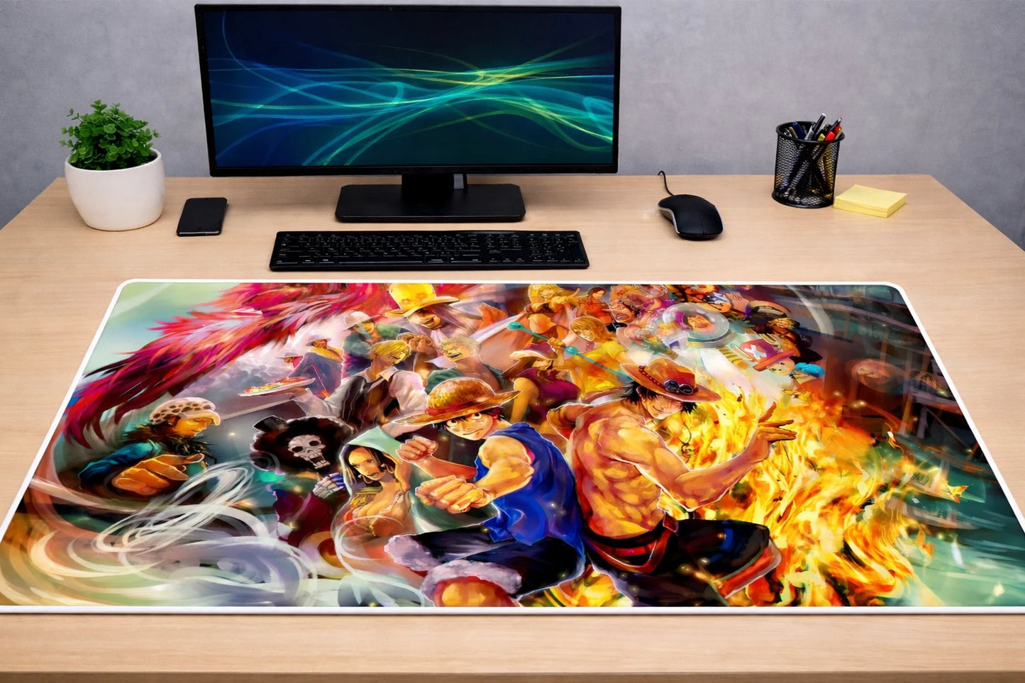 Large 24x12 inch One Piece mousepad featuring a fiery battle illustration with Luffy and Ace on a clean wooden desk setup.