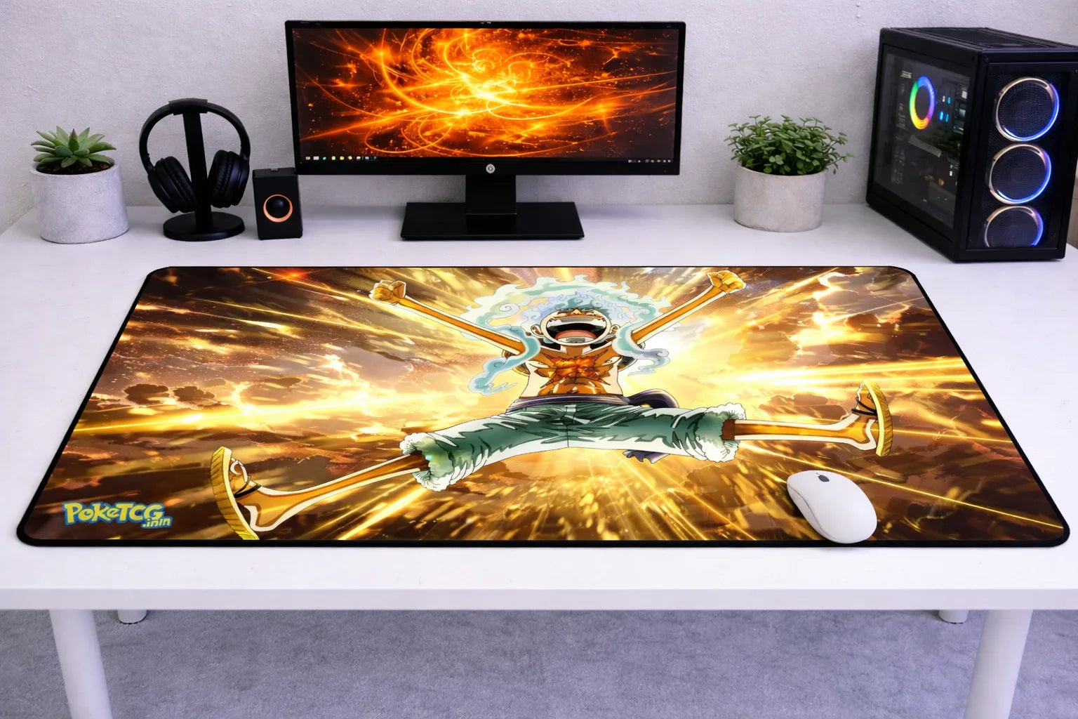 Large 24x12 inch One Piece mousepad featuring Luffy in his Gear 5 form with a radiant golden background on a clean gaming desk setup.