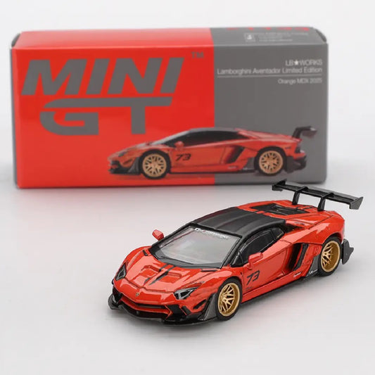 A red and black Mini GT Lamborghini Aventador S diecast model car with gold wheels, shown in front of its red and gray packaging box.