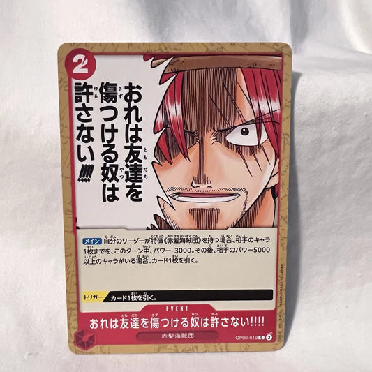 One Piece TCG event card OP09-019 titled Nobody Hurts a Friend of Mine featuring a close-up of Shanks with red hair and three scars over his left eye.