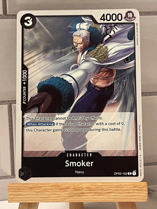 One Piece TCG Smoker OP02-102 rare character card from Paramount War set featuring smoke-based ability artwork and official English text.