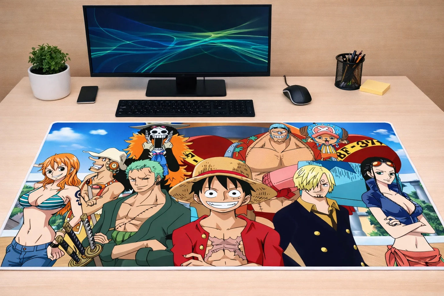 Large 24x12 inch One Piece mousepad featuring the post-time-skip Straw Hat crew on a white gaming desk setup.
