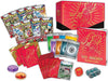 Pokémon trading card game items including cards, a box, and a player's guide on a white background.