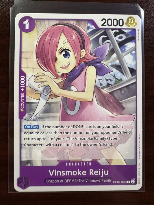 One Piece TCG character card OP07-062 featuring a young Vinsmoke Reiju with pink hair and a purple bow, holding a roll of bandages against a GERMA 66 background.