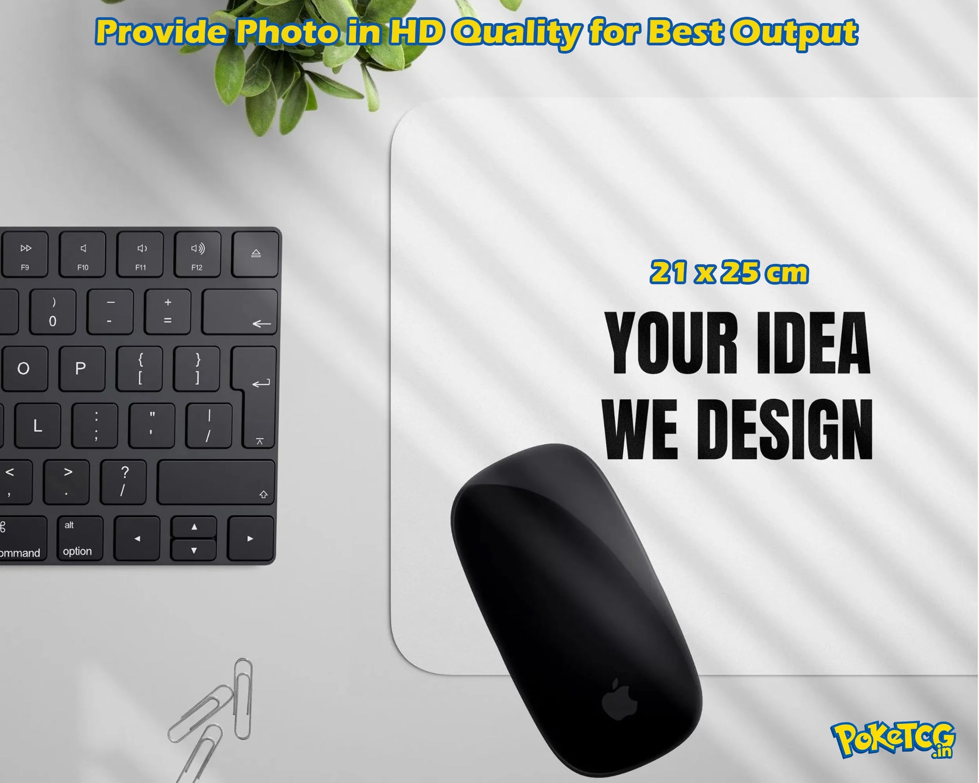 A promotional mockup showing a black computer mouse on a white mouse pad with a partial keyboard and plant visible, overlaid with text reading 'Provide Photo in HD Quality for Best Output,' '21 x 25 cm,' 'YOUR IDEA WE DESIGN,' and a PokéTCG logo.